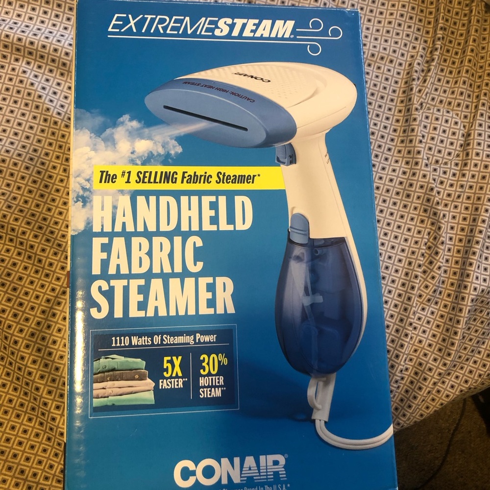 Handheld fabric steamer